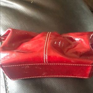 Small red patent leather coach bag